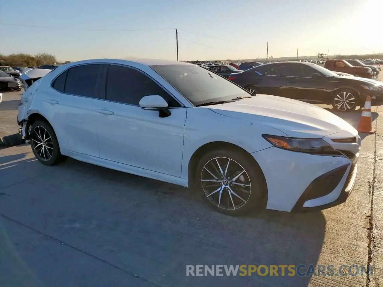 4 Photograph of a damaged car 4T1G11AKXNU659152 TOYOTA CAMRY 2022
