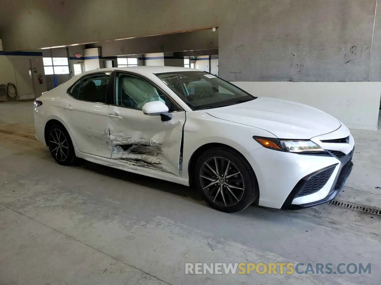 4 Photograph of a damaged car 4T1G11AKXNU665467 TOYOTA CAMRY 2022