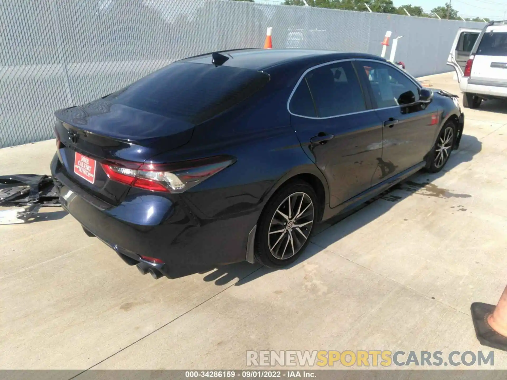 4 Photograph of a damaged car 4T1G11AKXNU665548 TOYOTA CAMRY 2022