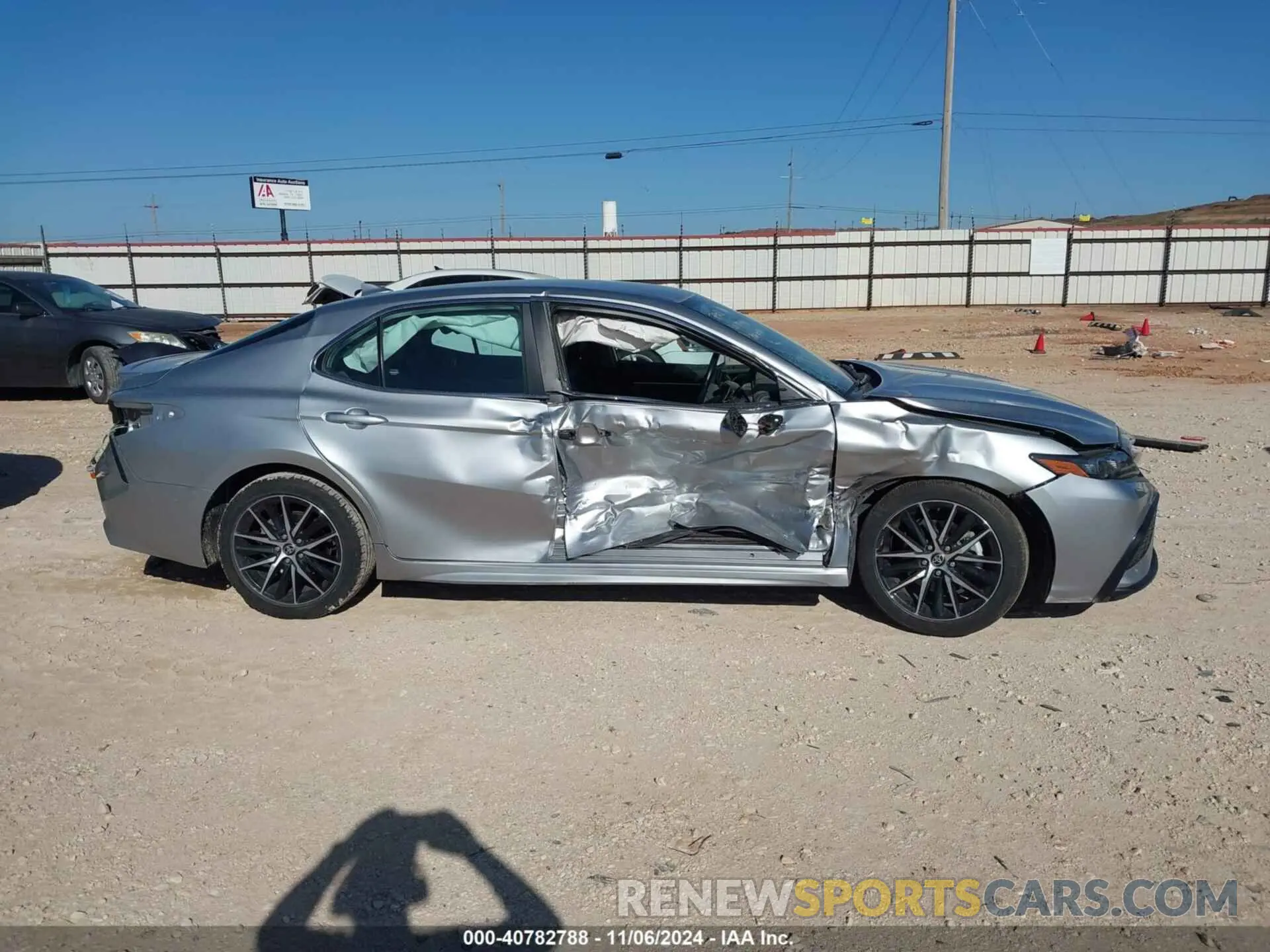 14 Photograph of a damaged car 4T1G11AKXNU697903 TOYOTA CAMRY 2022