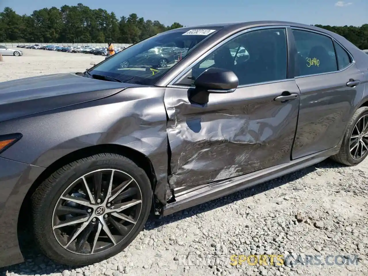 10 Photograph of a damaged car 4T1G11AKXNU698517 TOYOTA CAMRY 2022