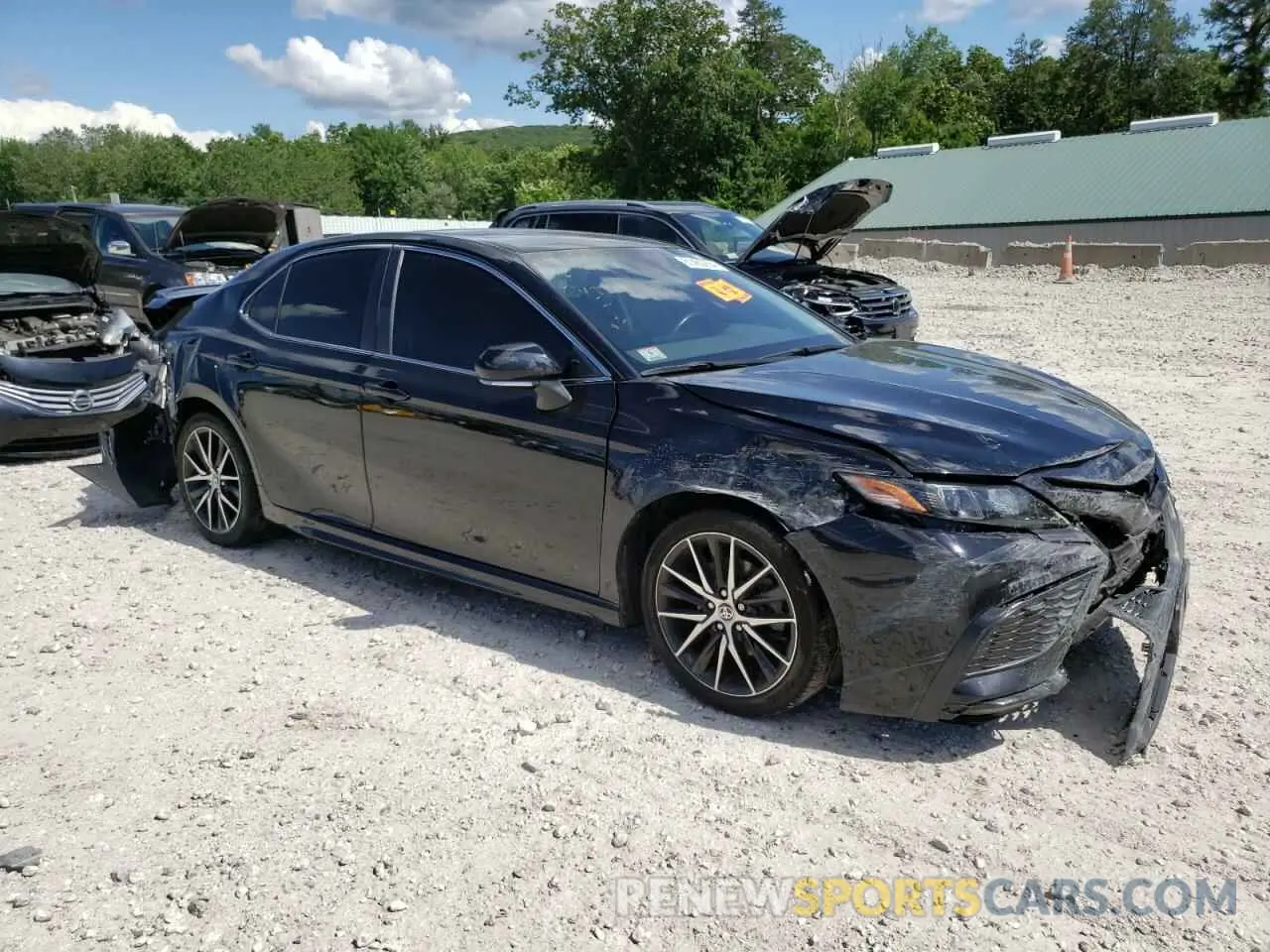 4 Photograph of a damaged car 4T1G11AKXNU700010 TOYOTA CAMRY 2022