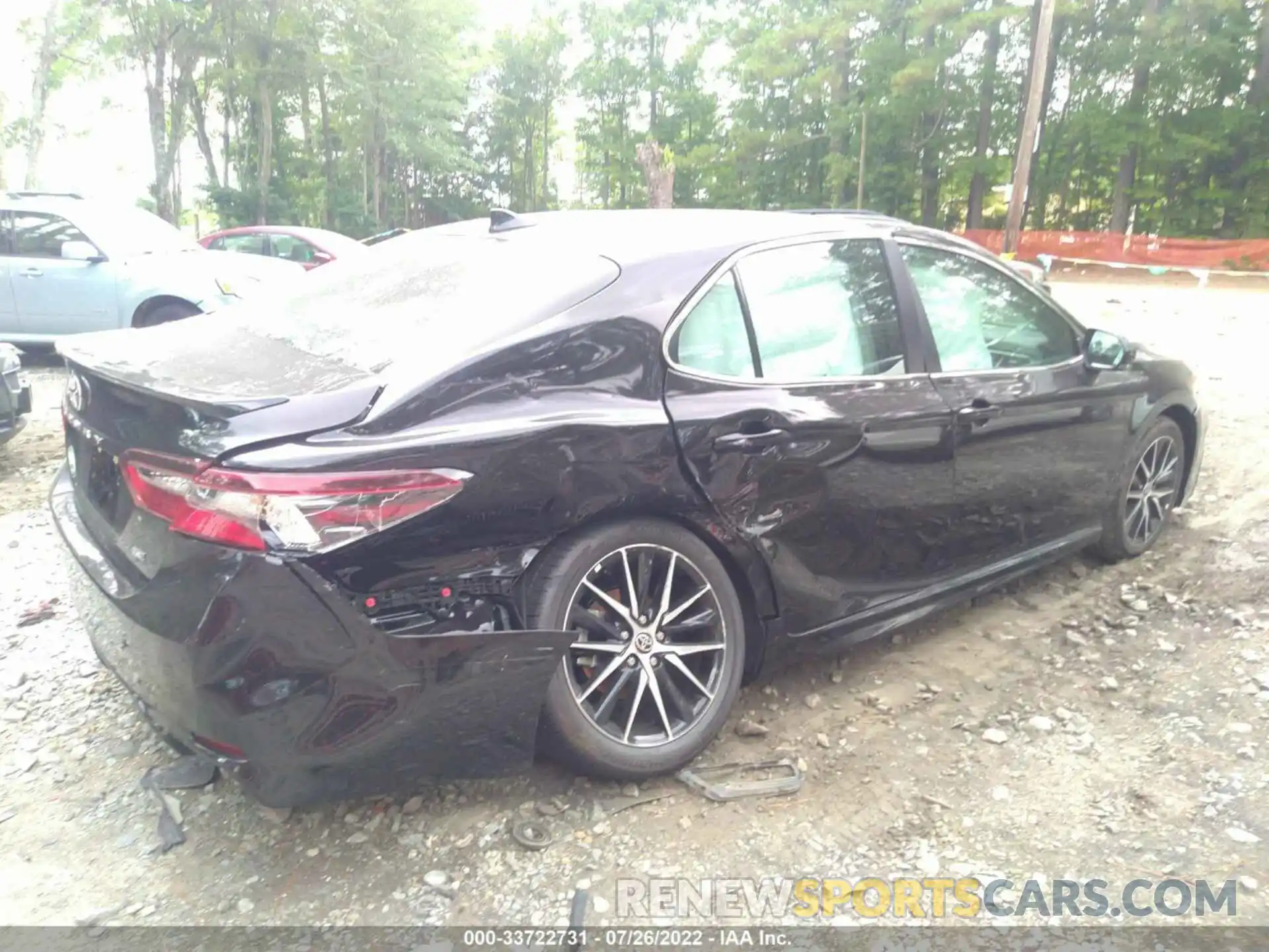 4 Photograph of a damaged car 4T1G11AKXNU700461 TOYOTA CAMRY 2022