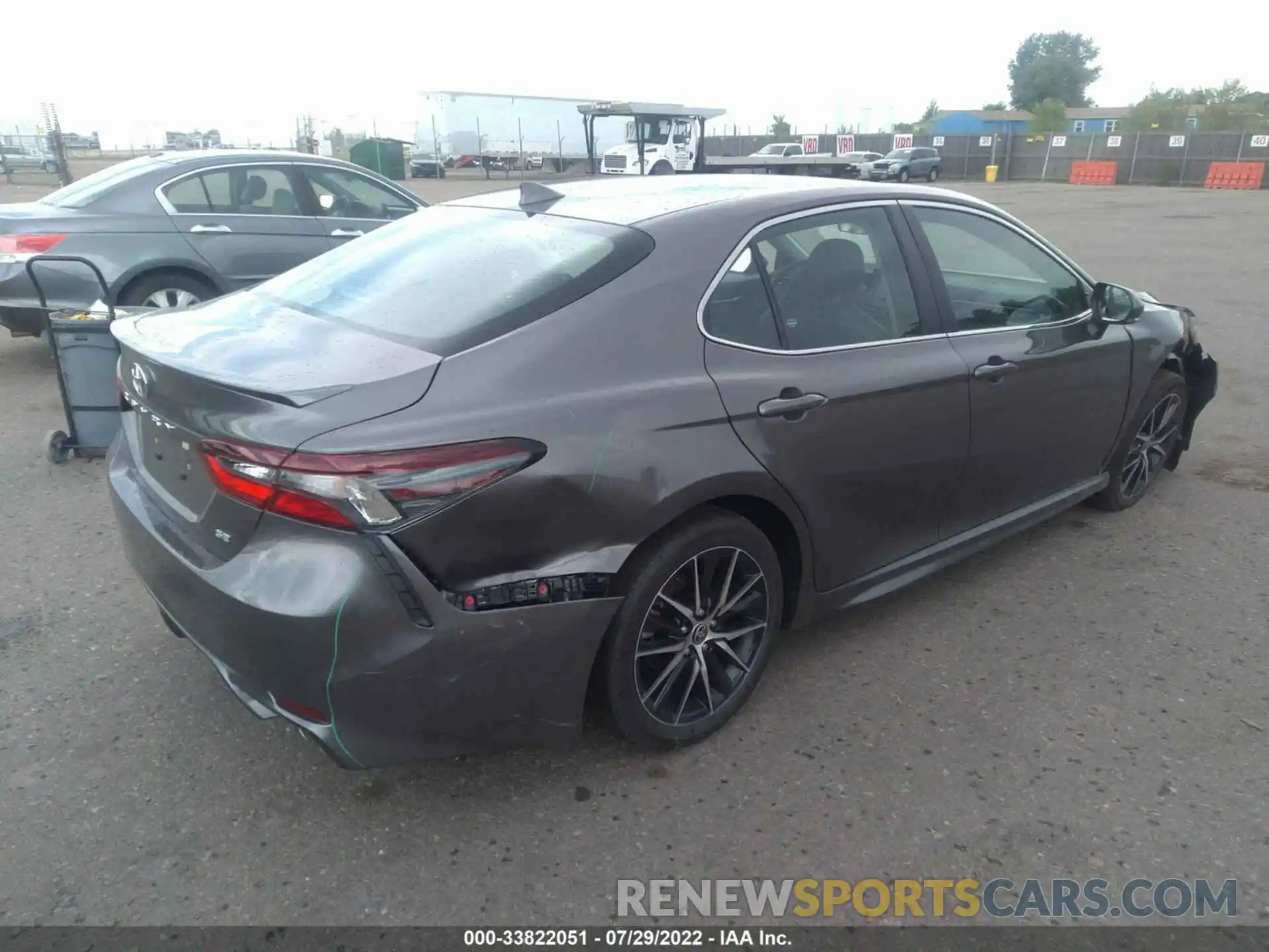 4 Photograph of a damaged car 4T1G11AKXNU706616 TOYOTA CAMRY 2022