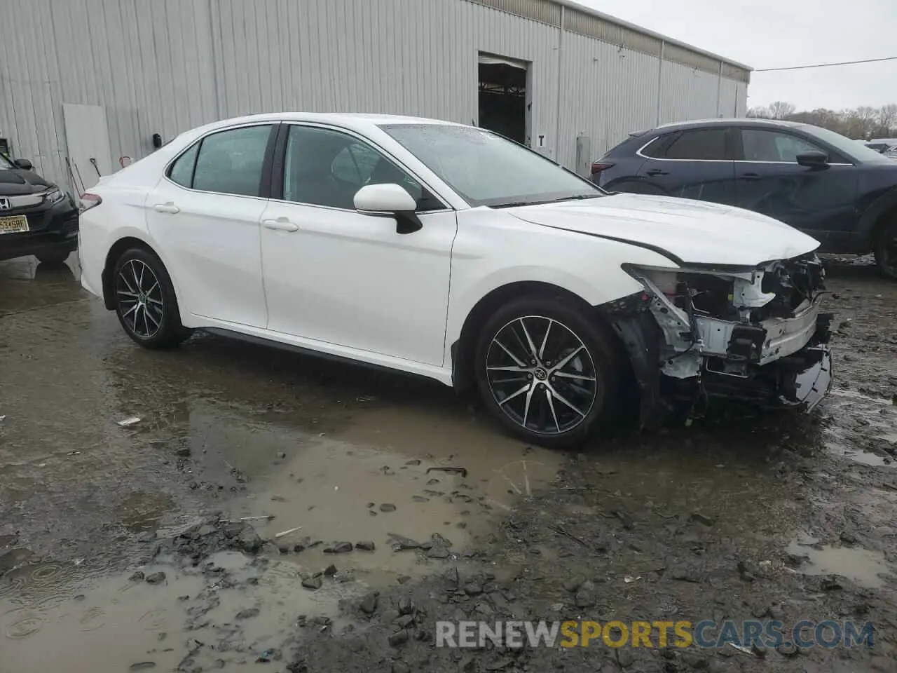 4 Photograph of a damaged car 4T1G11BK0NU066012 TOYOTA CAMRY 2022