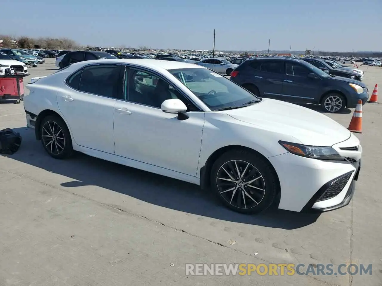 4 Photograph of a damaged car 4T1G11BK3NU055750 TOYOTA CAMRY 2022
