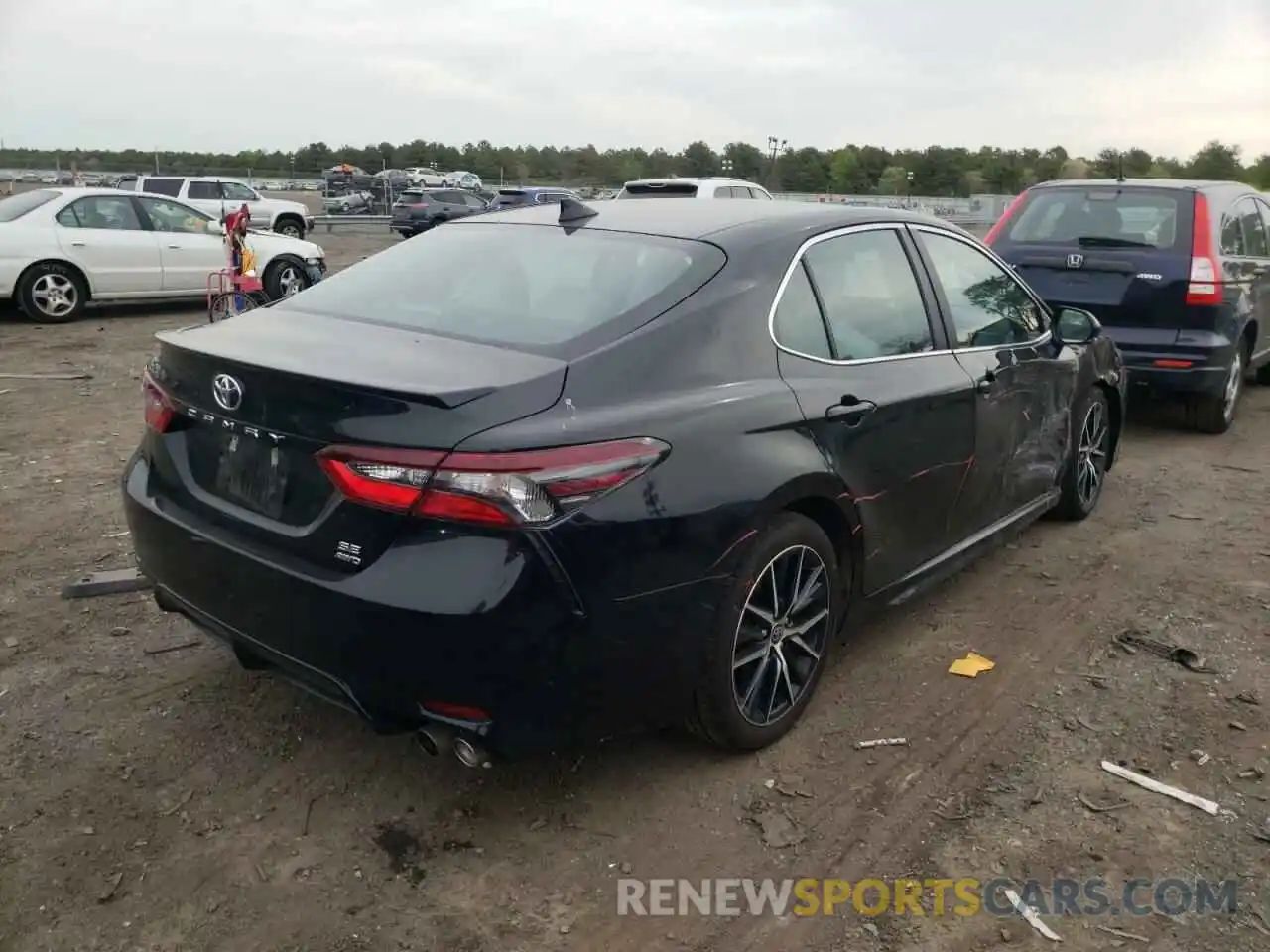 4 Photograph of a damaged car 4T1G11BK4NU053991 TOYOTA CAMRY 2022