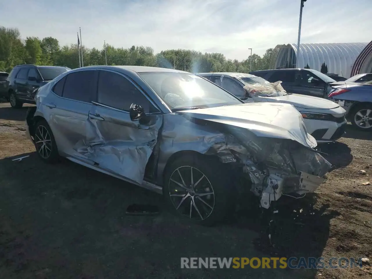 4 Photograph of a damaged car 4T1G11BK5NU053255 TOYOTA CAMRY 2022