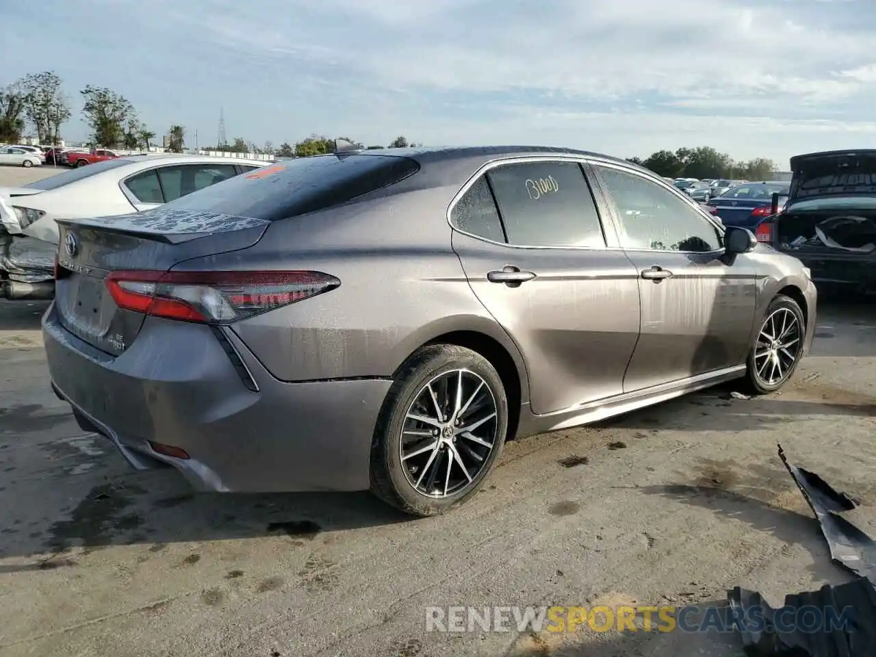 3 Photograph of a damaged car 4T1G31AK6NU595038 TOYOTA CAMRY 2022