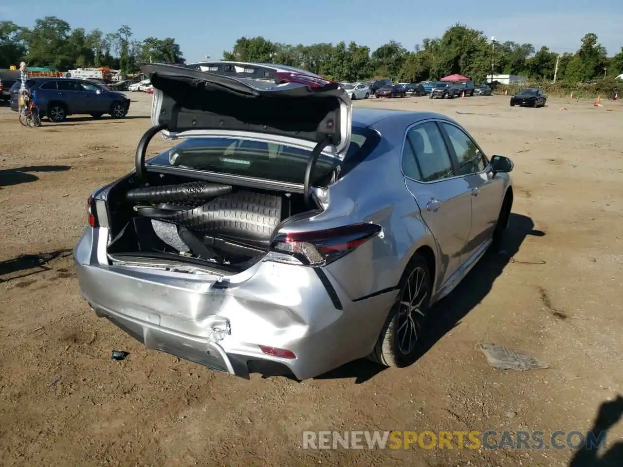 4 Photograph of a damaged car 4T1G31AK9NU593459 TOYOTA CAMRY 2022