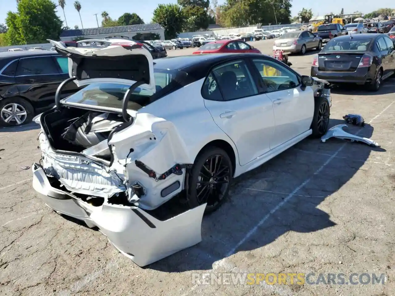 4 Photograph of a damaged car 4T1K31AK0NU042878 TOYOTA CAMRY 2022