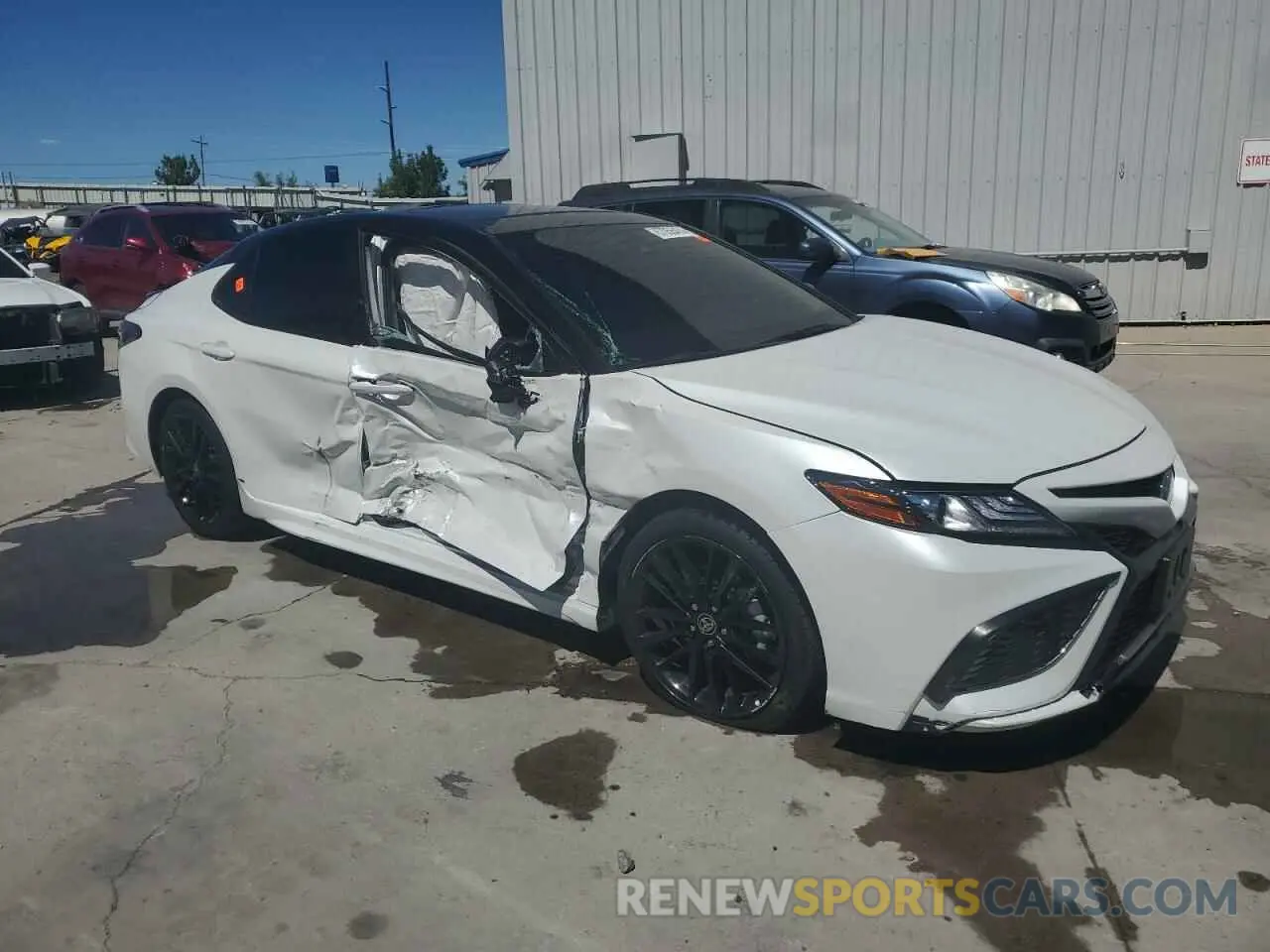 4 Photograph of a damaged car 4T1K31AK5NU036896 TOYOTA CAMRY 2022