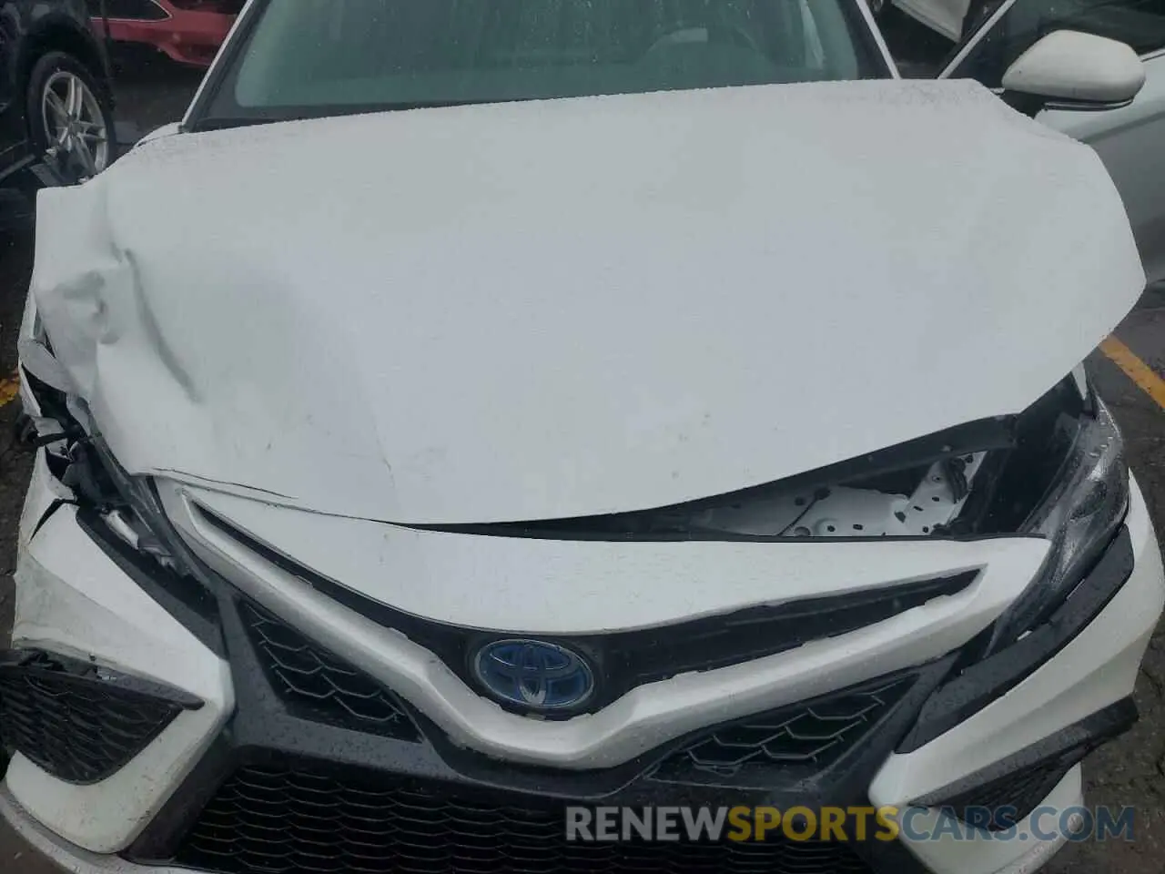 11 Photograph of a damaged car 4T1K31AK7NU594071 TOYOTA CAMRY 2022