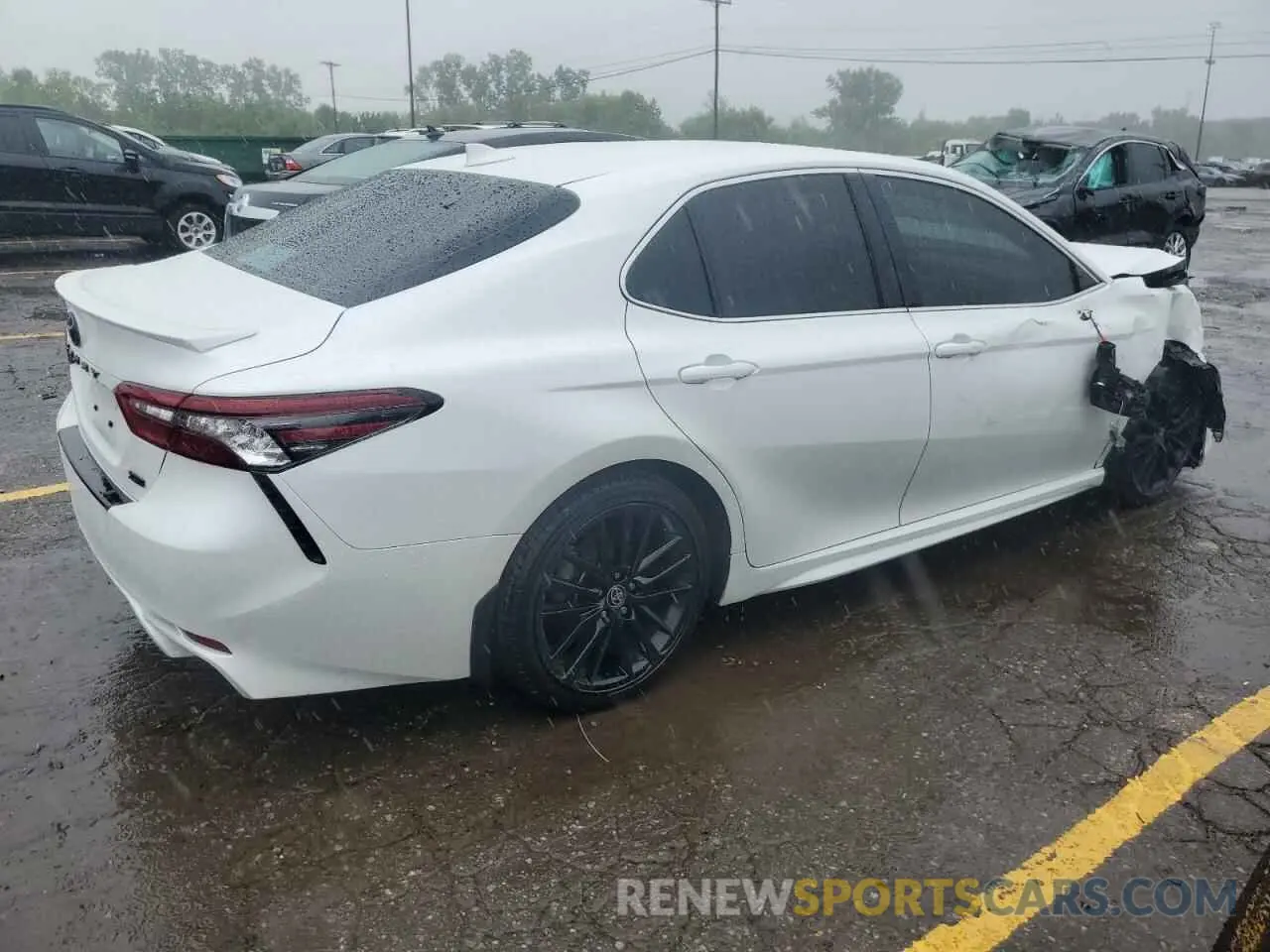 3 Photograph of a damaged car 4T1K31AK7NU594071 TOYOTA CAMRY 2022
