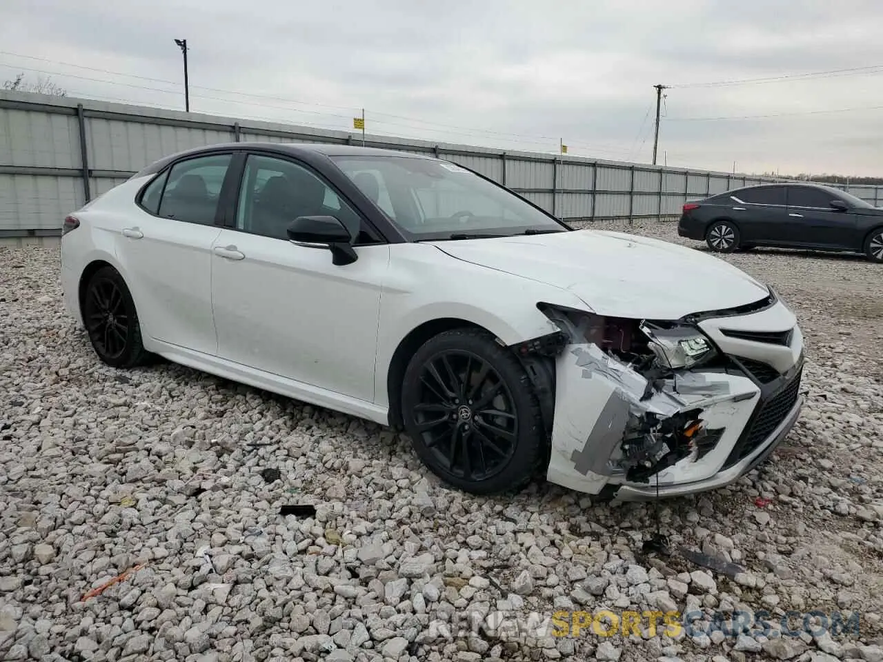 4 Photograph of a damaged car 4T1K31AK9NU033175 TOYOTA CAMRY 2022