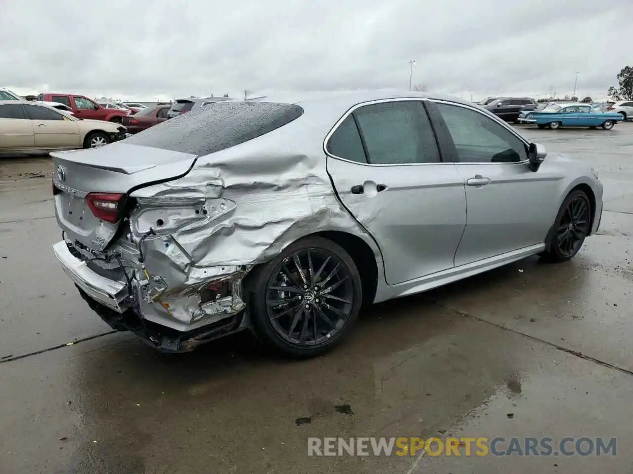 3 Photograph of a damaged car 4T1K31AKXNU594811 TOYOTA CAMRY 2022