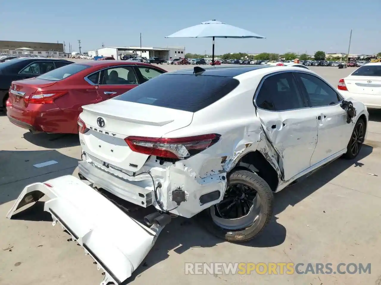 4 Photograph of a damaged car 4T1K61AK0NU711934 TOYOTA CAMRY 2022