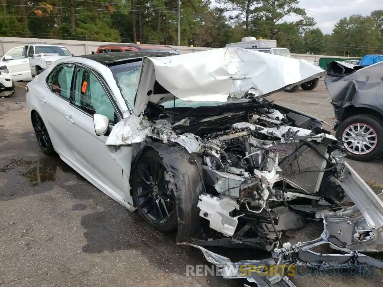 4 Photograph of a damaged car 4T1K61AK5NU014856 TOYOTA CAMRY 2022