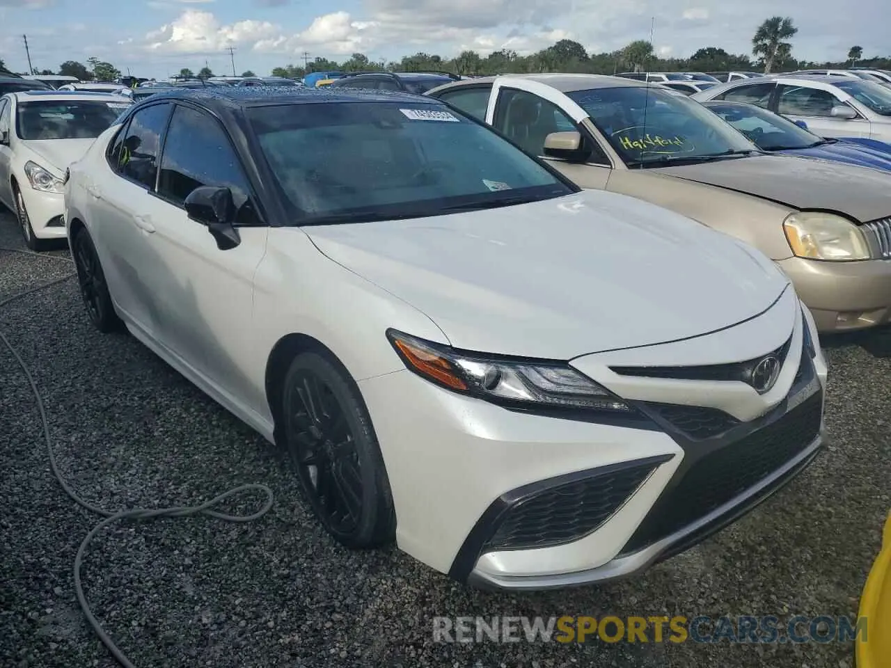 4 Photograph of a damaged car 4T1K61BK0NU048587 TOYOTA CAMRY 2022