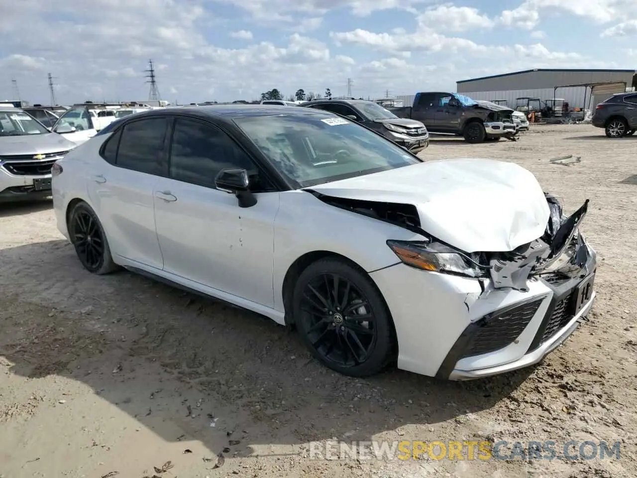 4 Photograph of a damaged car 4T1KZ1AK0NU069397 TOYOTA CAMRY 2022