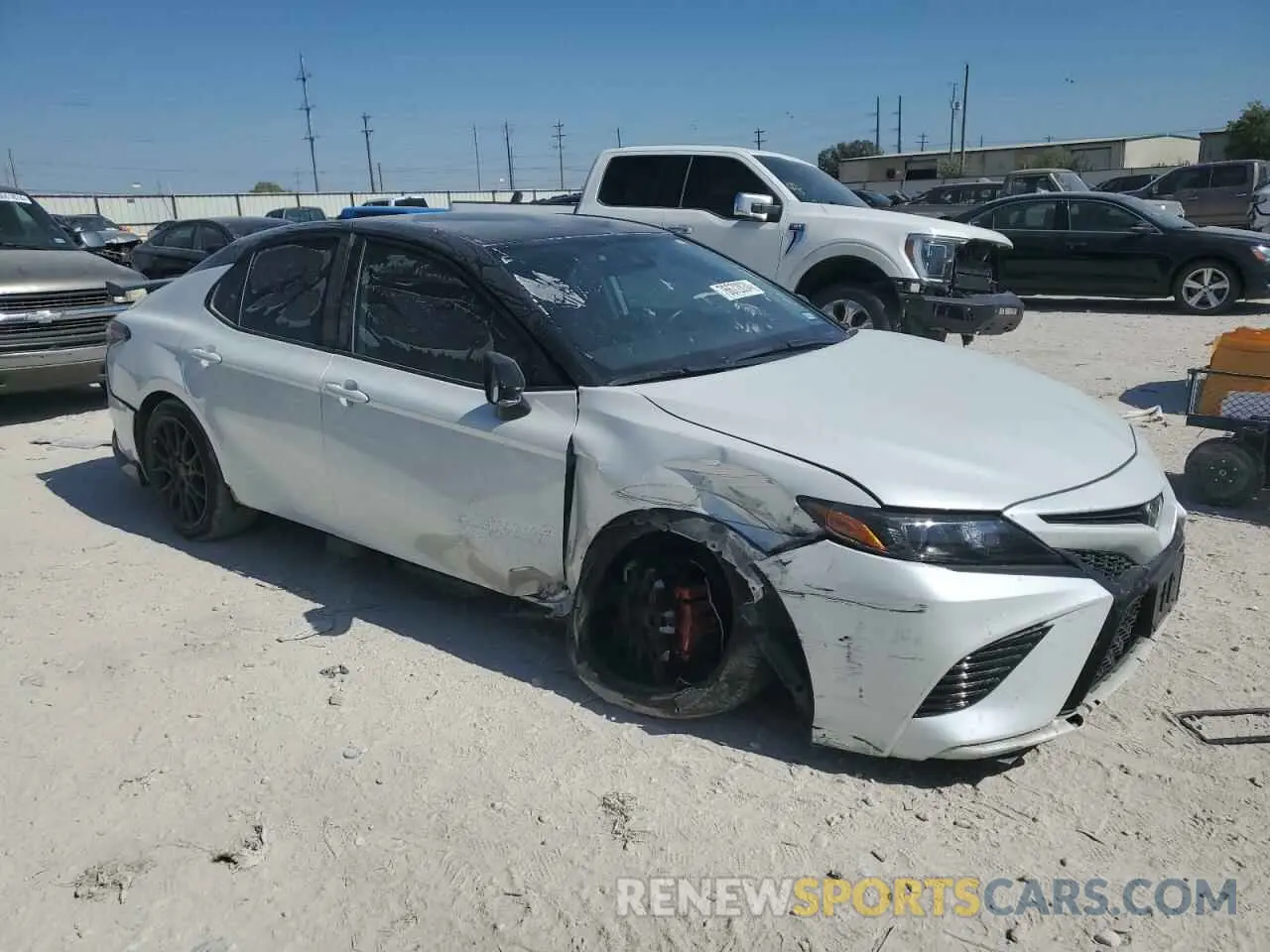 4 Photograph of a damaged car 4T1KZ1AK1NU069537 TOYOTA CAMRY 2022