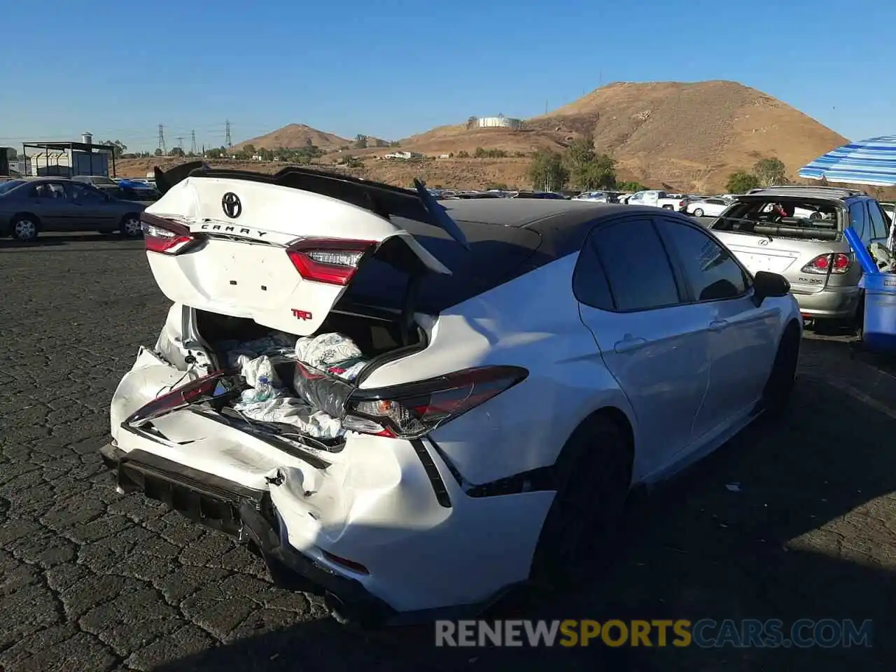 4 Photograph of a damaged car 4T1KZ1AK9NU069687 TOYOTA CAMRY 2022