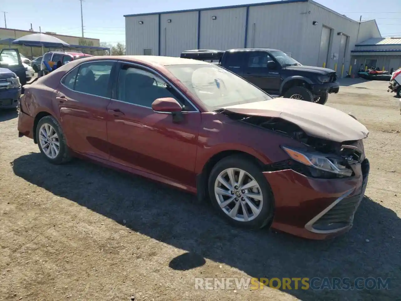 4 Photograph of a damaged car 4T1R11AK1NU070449 TOYOTA CAMRY 2022