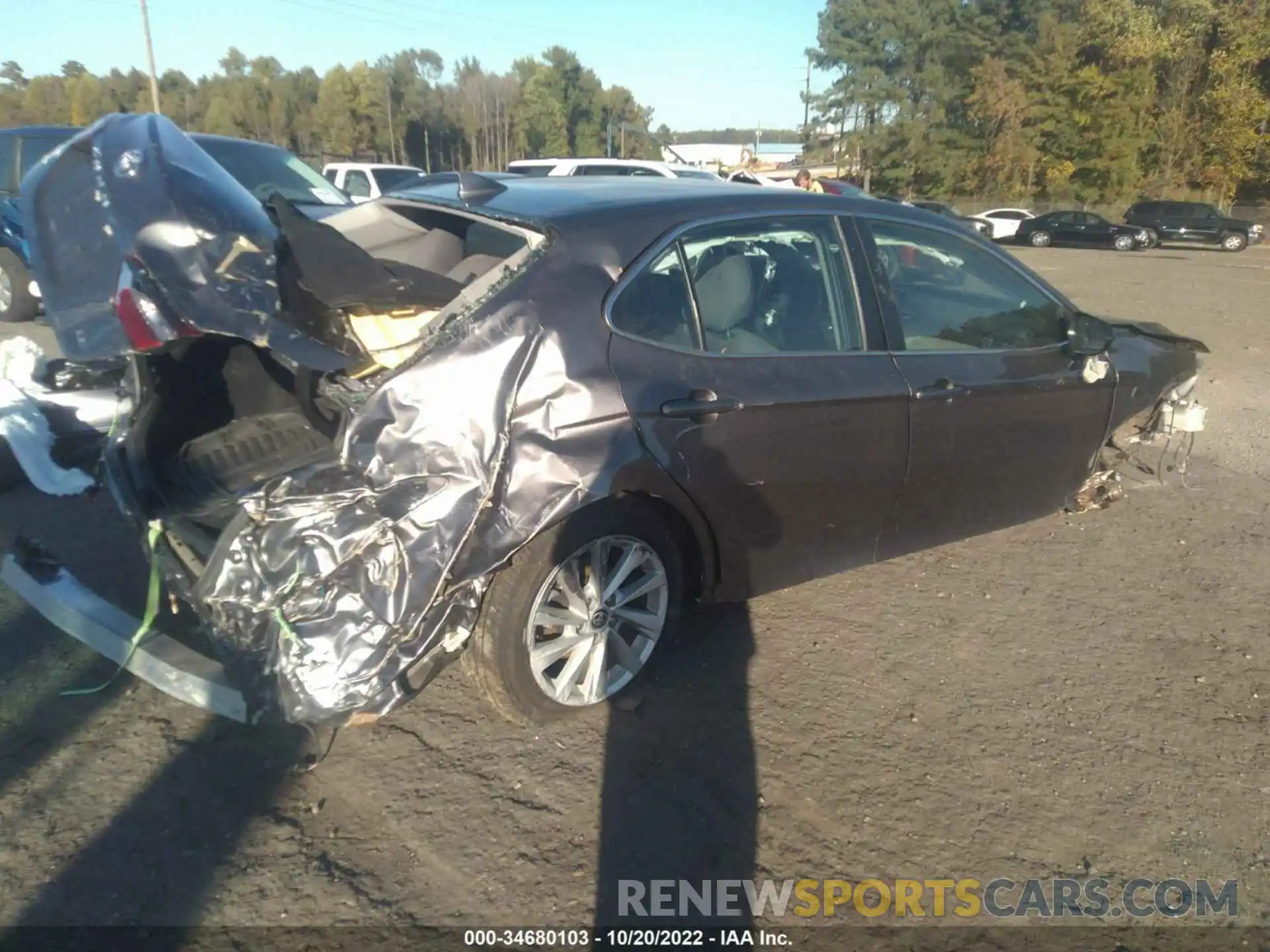 4 Photograph of a damaged car 4T1R11AK7NU662602 TOYOTA CAMRY 2022