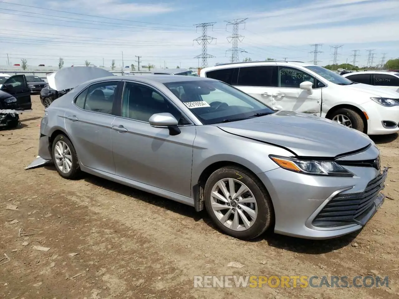 4 Photograph of a damaged car 4T1R11AK9NU074328 TOYOTA CAMRY 2022