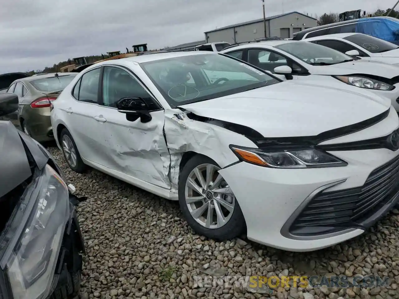 4 Photograph of a damaged car 4T1R11AK9NU678560 TOYOTA CAMRY 2022