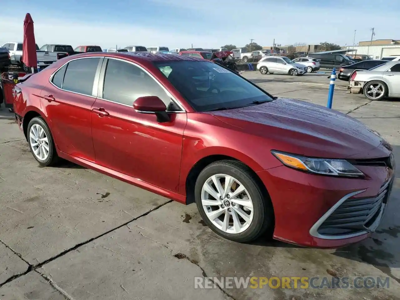 4 Photograph of a damaged car 4T1R11AKXNU049888 TOYOTA CAMRY 2022