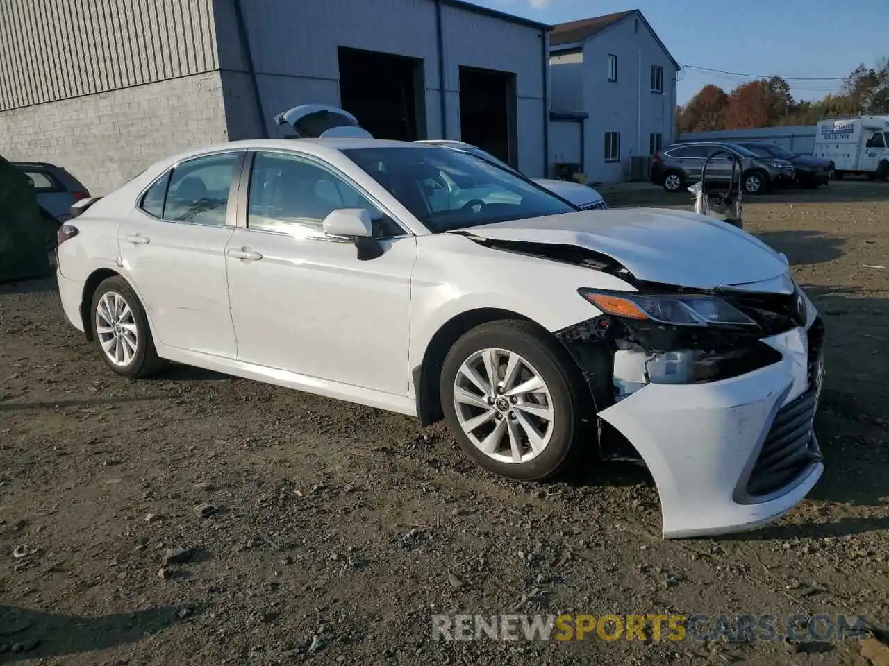 4 Photograph of a damaged car 4T1R11AKXNU703207 TOYOTA CAMRY 2022