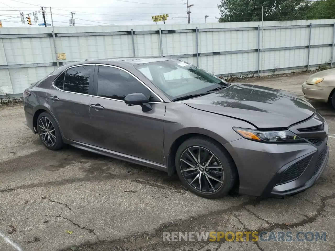 4 Photograph of a damaged car 4T1S11AKXNU679489 TOYOTA CAMRY 2022