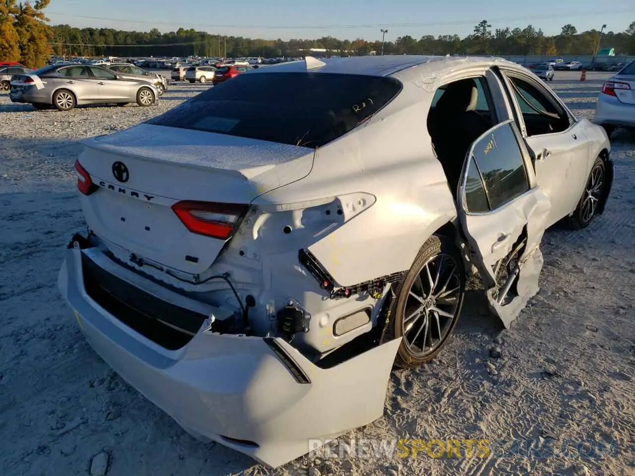 4 Photograph of a damaged car 4T1T11AK1NU056301 TOYOTA CAMRY 2022