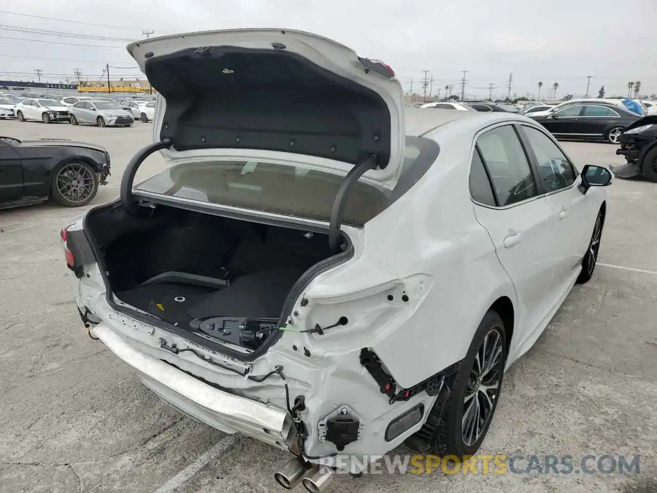 4 Photograph of a damaged car 4T1T11AK2NU054850 TOYOTA CAMRY 2022