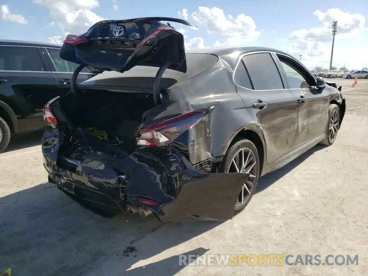 4 Photograph of a damaged car 4T1T11AK3NU632034 TOYOTA CAMRY 2022