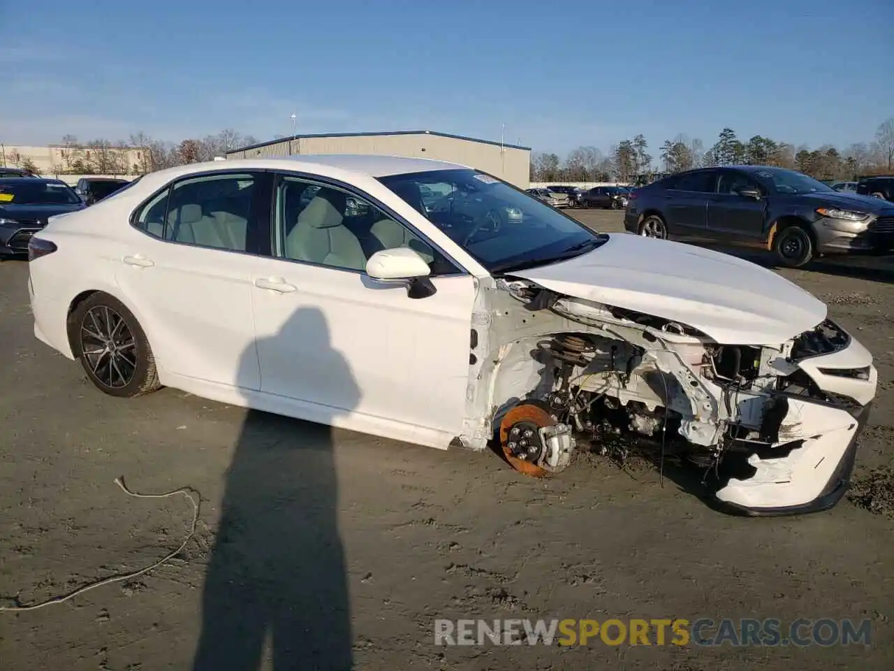 4 Photograph of a damaged car 4T1T11AK4NU678147 TOYOTA CAMRY 2022