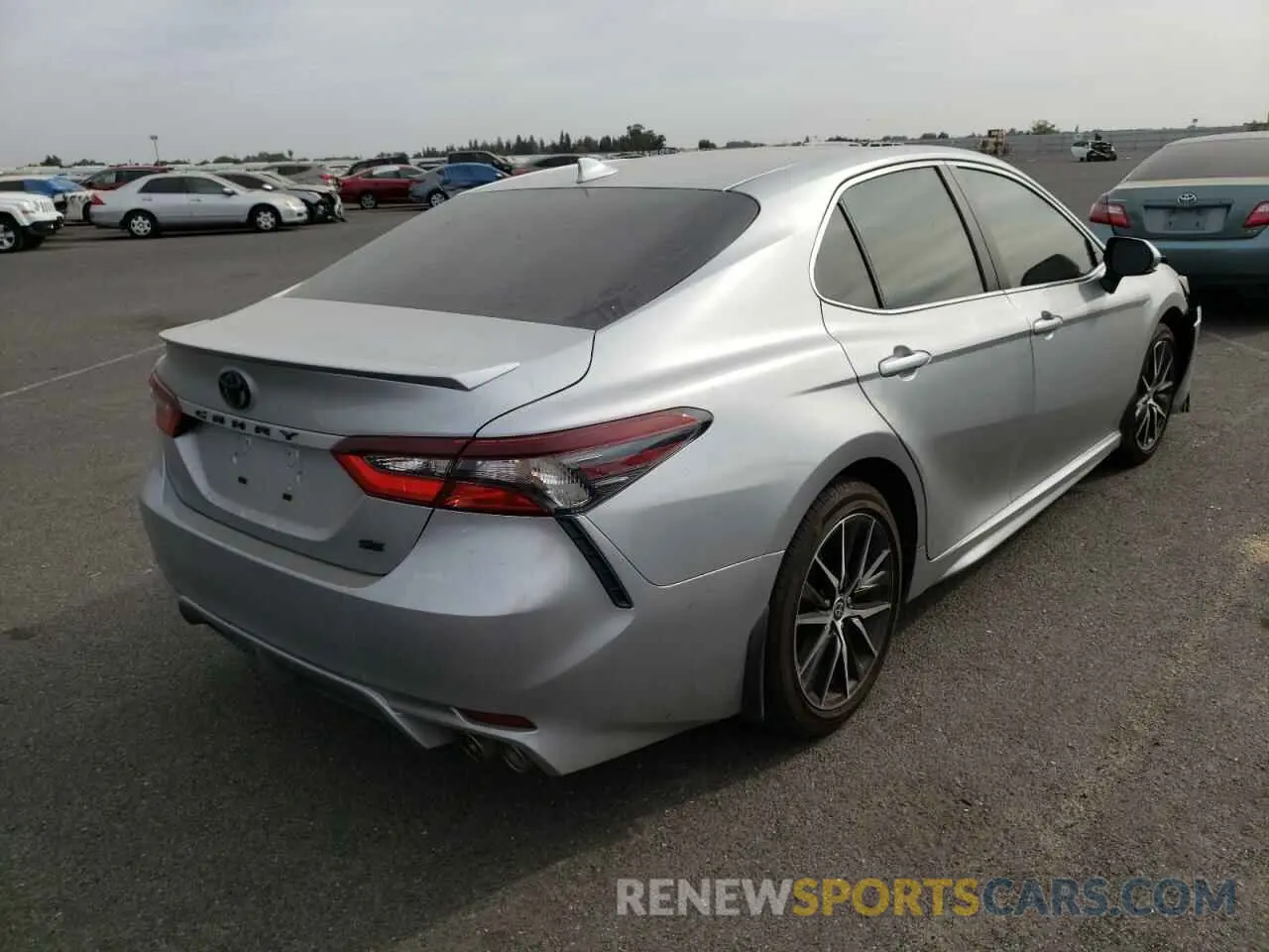 4 Photograph of a damaged car 4T1T11AK6NU674956 TOYOTA CAMRY 2022