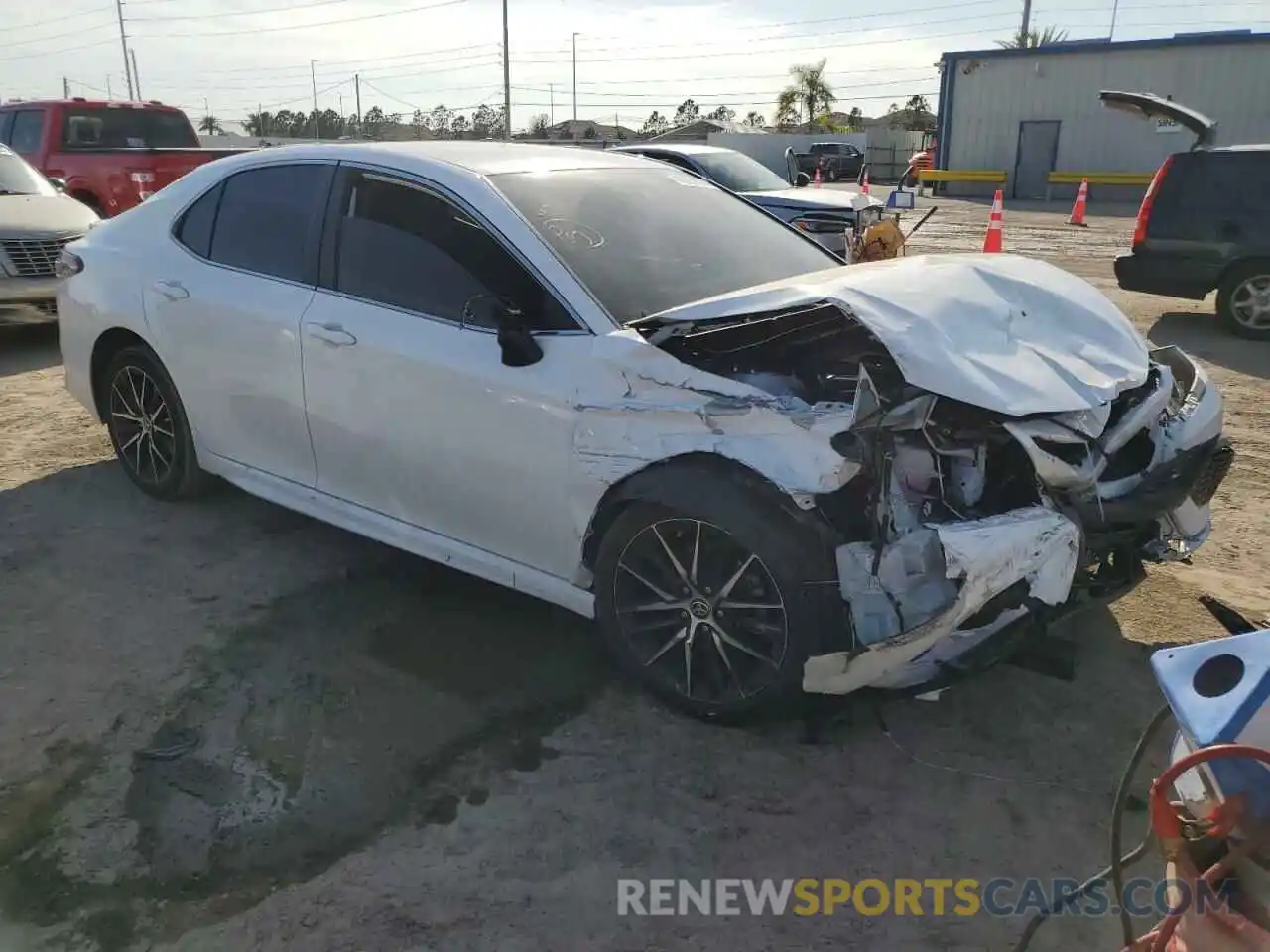 4 Photograph of a damaged car 4T1T11AK8NU706192 TOYOTA CAMRY 2022