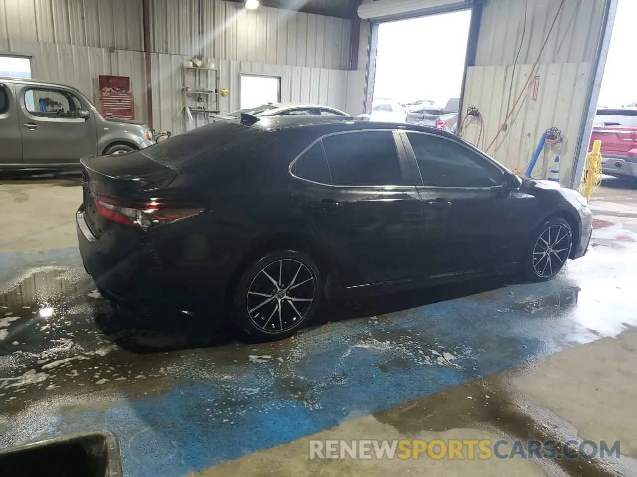 3 Photograph of a damaged car 4T1T11AK9NU663479 TOYOTA CAMRY 2022