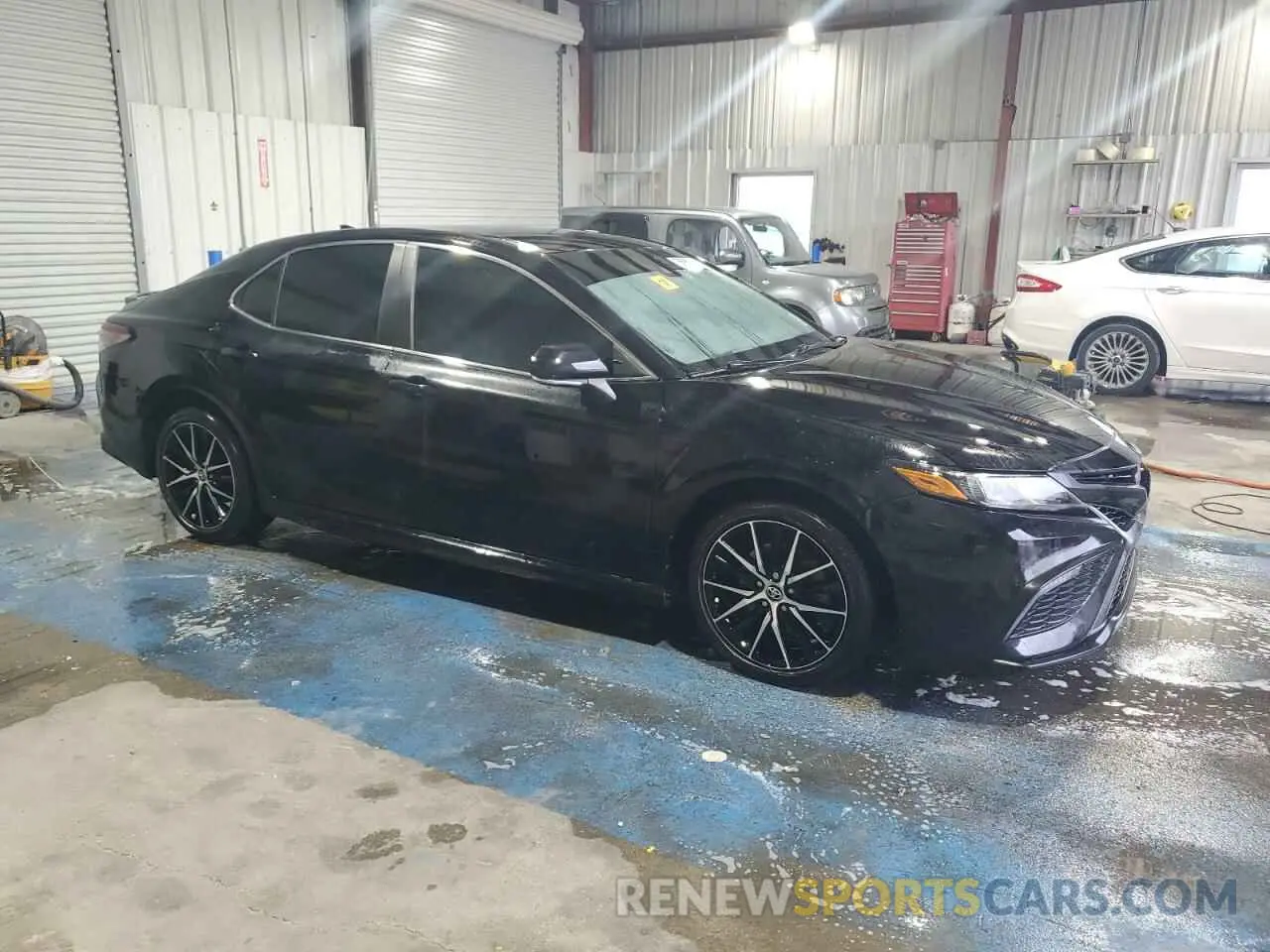 4 Photograph of a damaged car 4T1T11AK9NU663479 TOYOTA CAMRY 2022