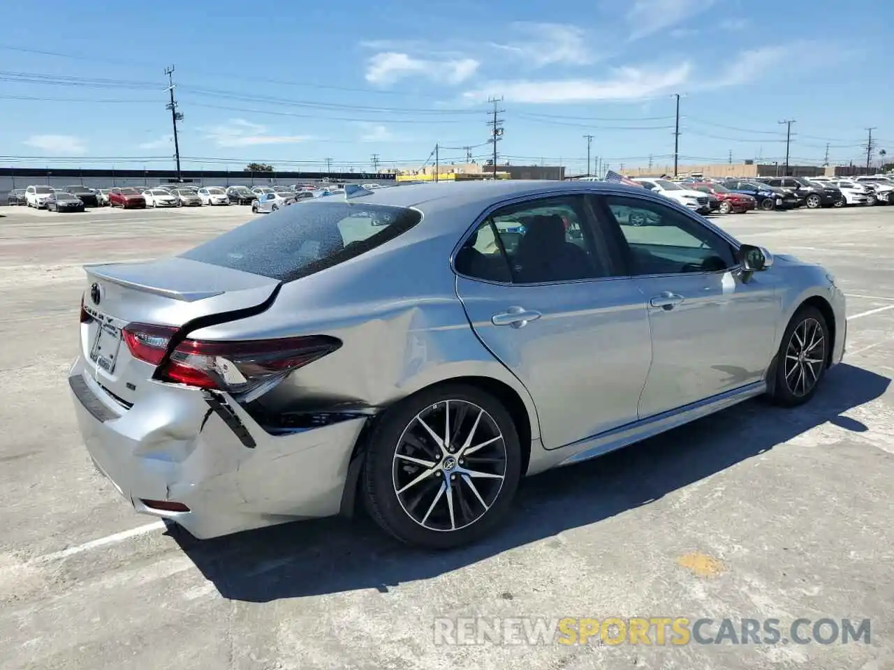 4 Photograph of a damaged car 4T1T11AK9NU697163 TOYOTA CAMRY 2022