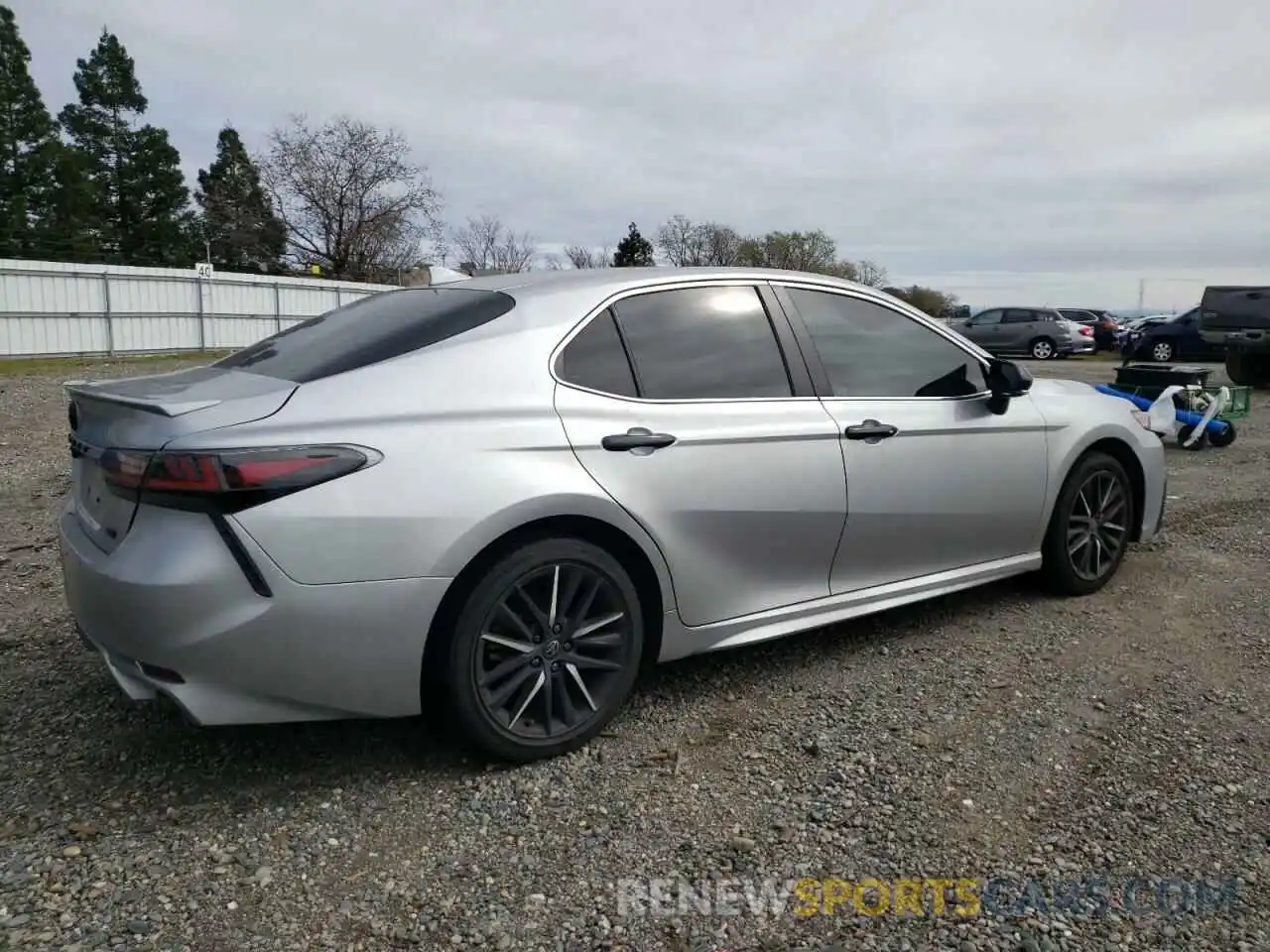 3 Photograph of a damaged car 4T1T11AKXNU637117 TOYOTA CAMRY 2022