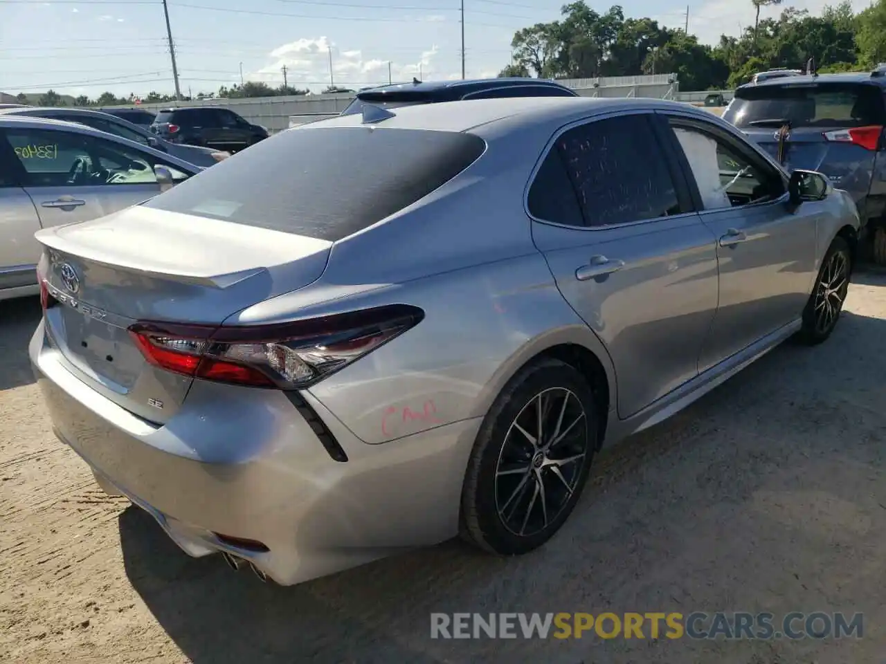 4 Photograph of a damaged car 4T1T11AKXNU669811 TOYOTA CAMRY 2022