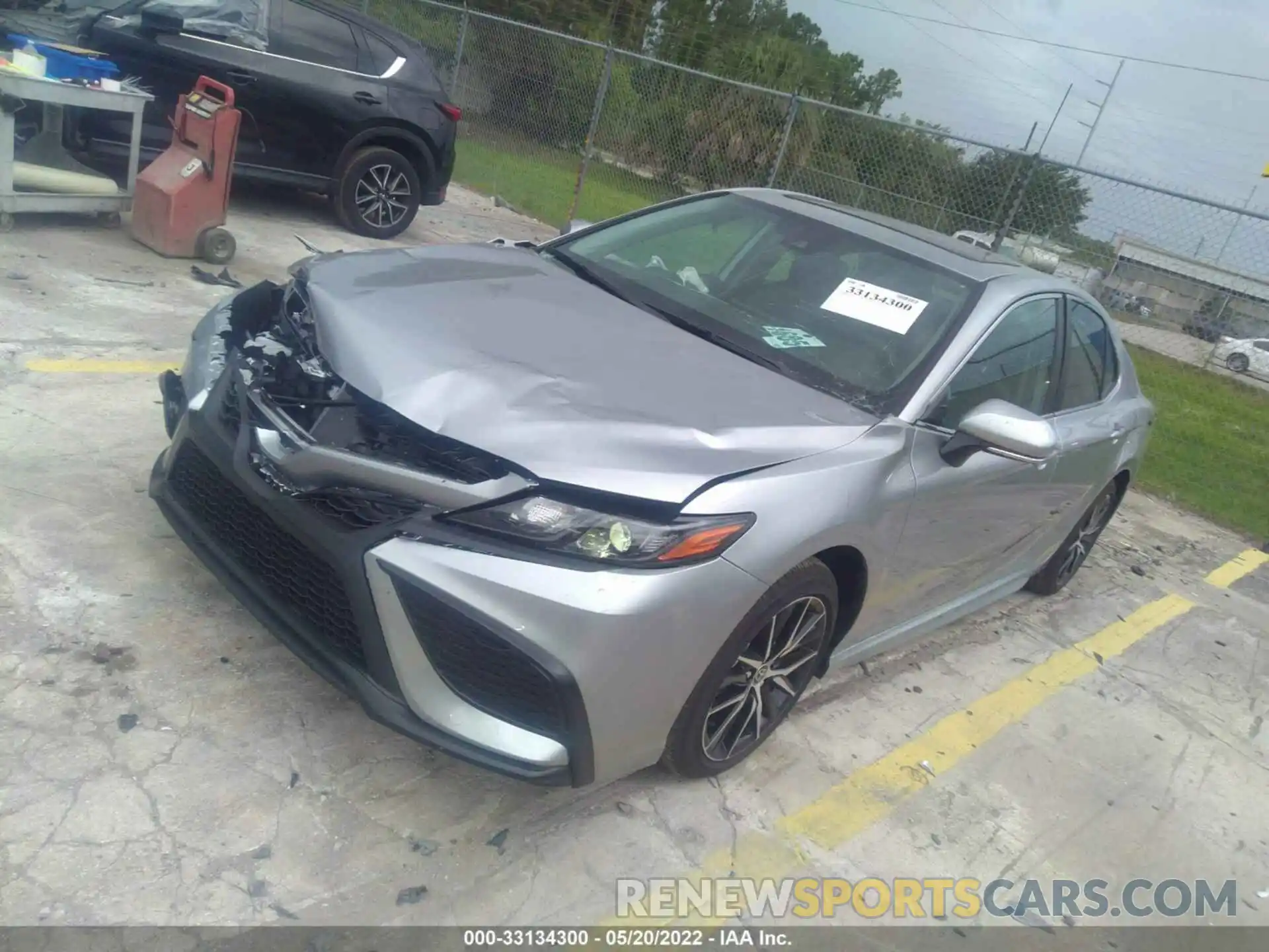 2 Photograph of a damaged car 4T1T11AKXNU676435 TOYOTA CAMRY 2022