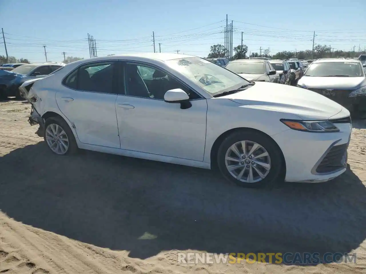 4 Photograph of a damaged car 4T1C11AK0PU089986 TOYOTA CAMRY 2023