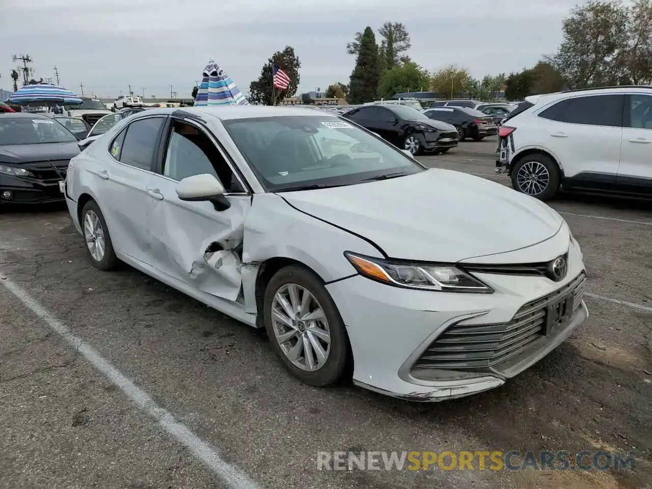 4 Photograph of a damaged car 4T1C11AK0PU120671 TOYOTA CAMRY 2023