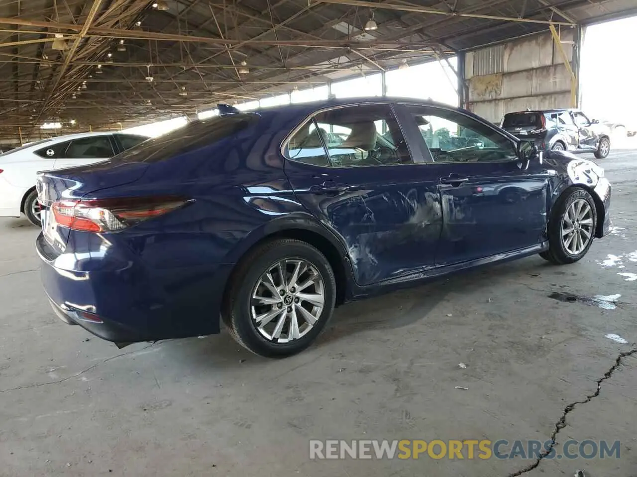 3 Photograph of a damaged car 4T1C11AK1PU111011 TOYOTA CAMRY 2023
