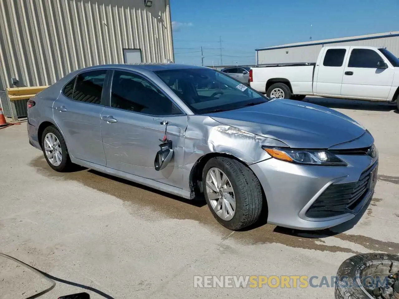 4 Photograph of a damaged car 4T1C11AK1PU759741 TOYOTA CAMRY 2023