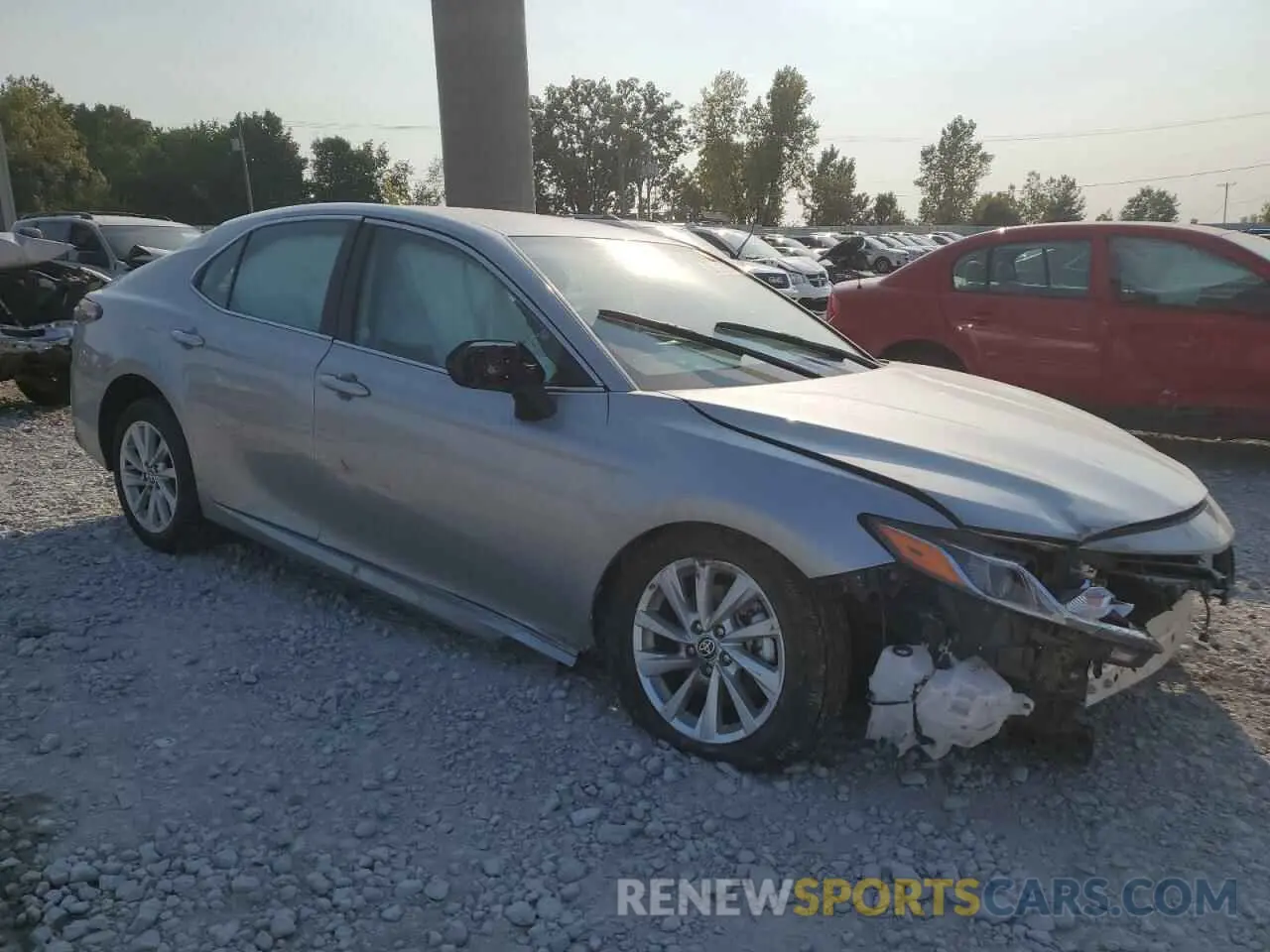4 Photograph of a damaged car 4T1C11AK1PU786261 TOYOTA CAMRY 2023